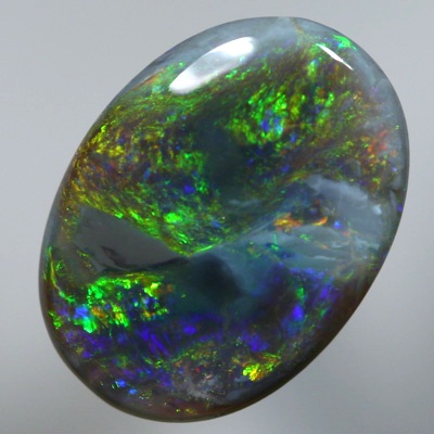 SOLID SEMI BLACK OPAL Swirls of gem fire mixed with black opal, unique show